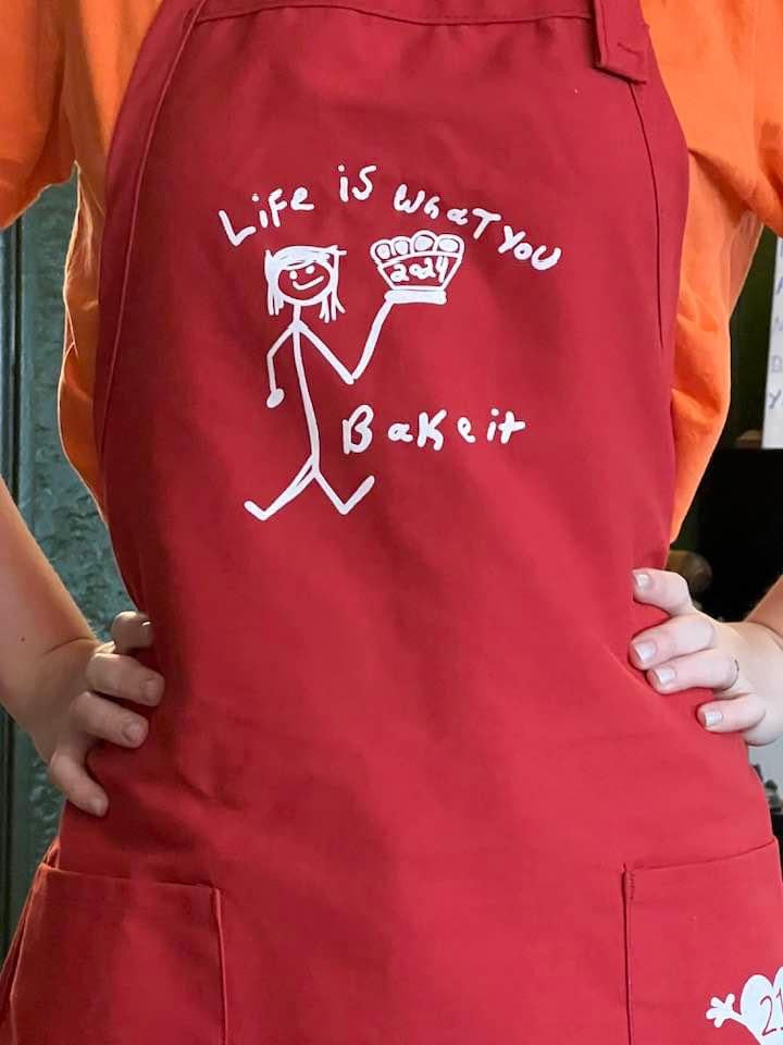 LIFE IS WHAT YOU BAKE IT Apron - RED